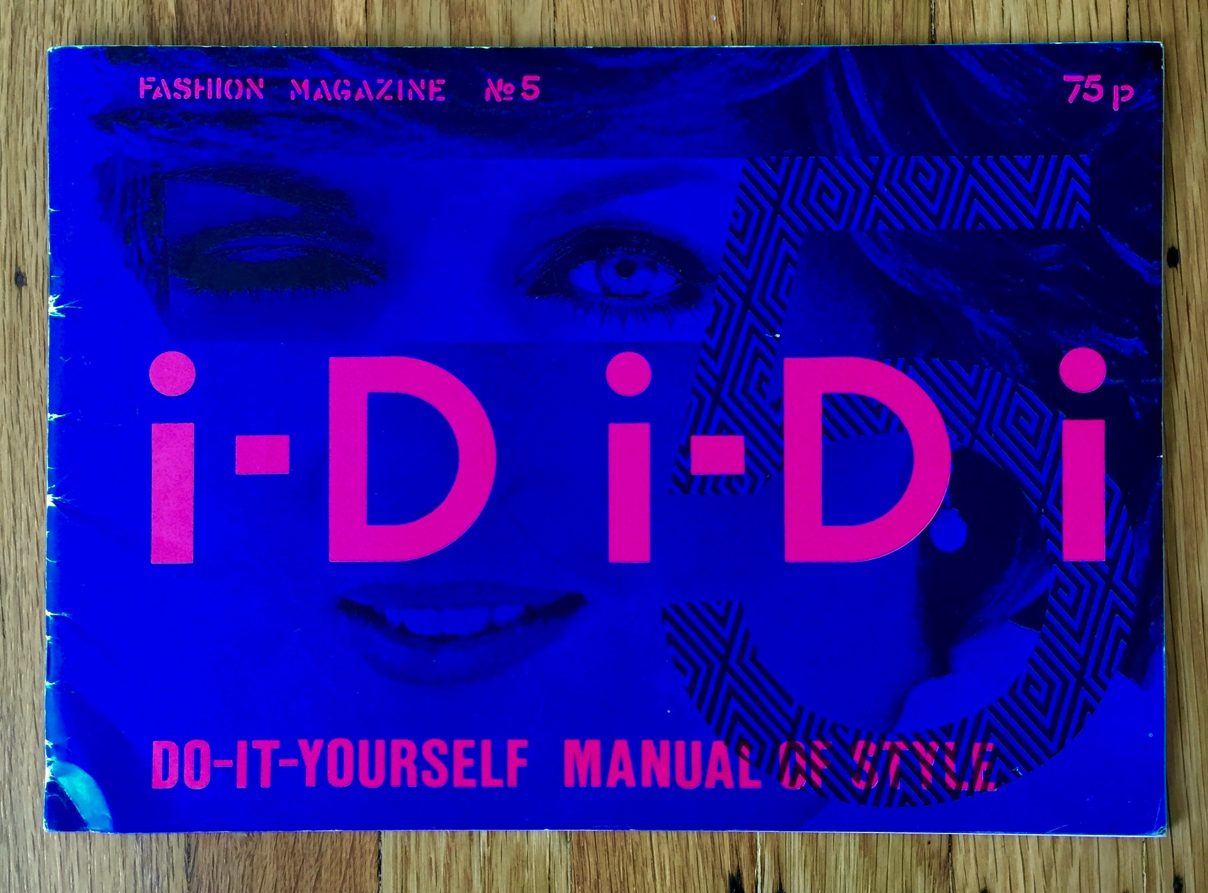 Issue 5 of I-D Magazine. The cover is a dark bright blue with pink letters saying i-D i-D i and in the background is a 5 and a photofit of Lady Di