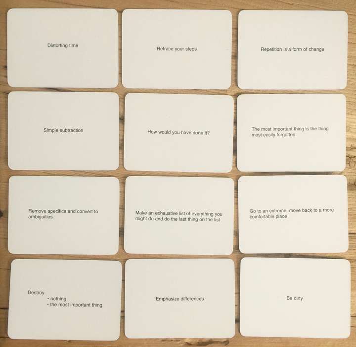 A 3x4 layout of 12 cards from Oblique Strategies