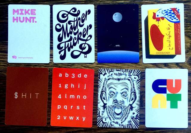 8 designer cards from cards against humanities