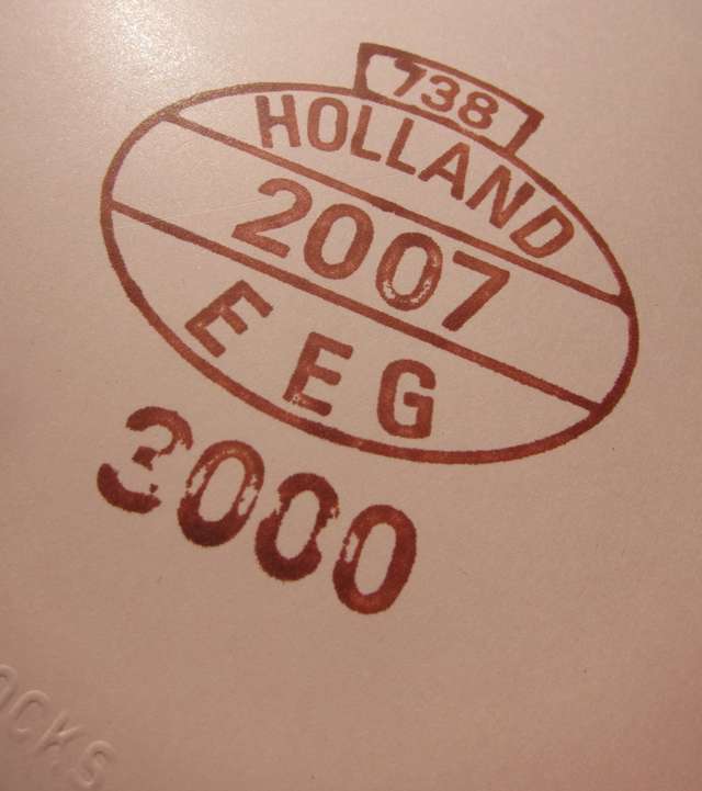 A feature from the cover of the book Pig 05049, showing the the official control stamp