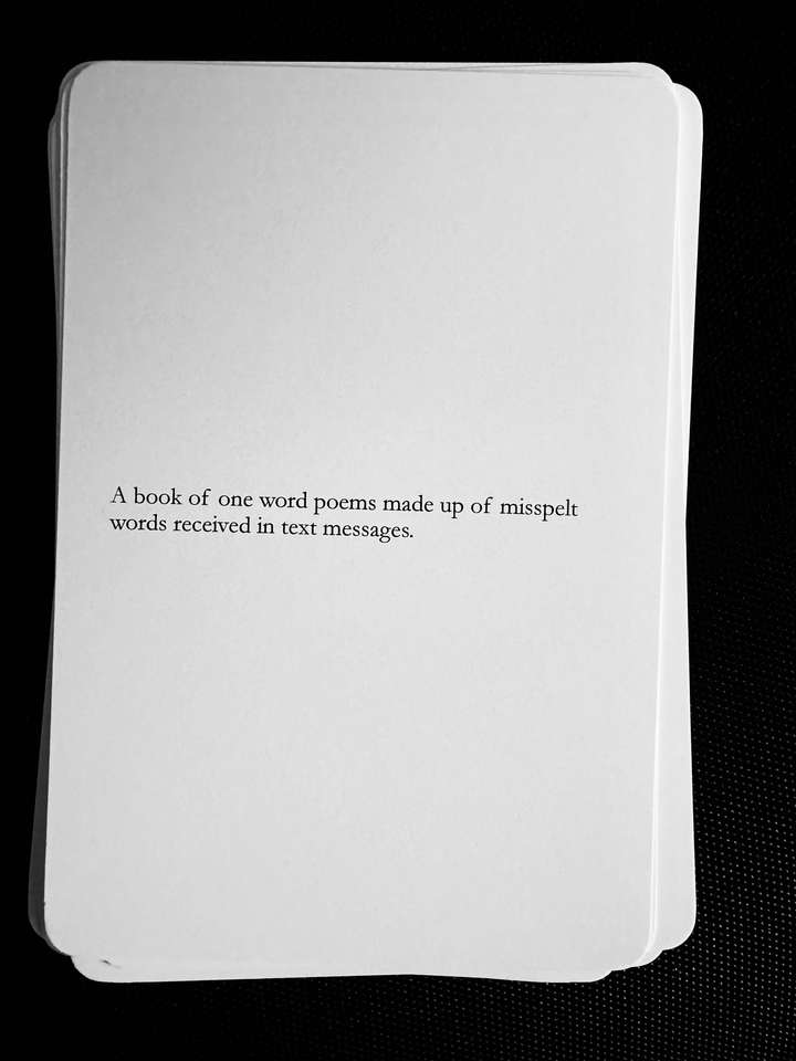 A card saying: A book of one word poems made up of misspelt words received in text messages.