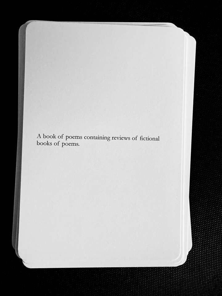 A card saying: A book of poems containing reviews of fictional books of poems.